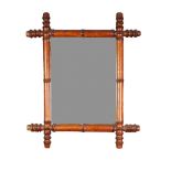 BAMBOO PATTERN TURNED MAHOGANY FRAMED WALL MIRROR, the oblong plate within a frame with crossed