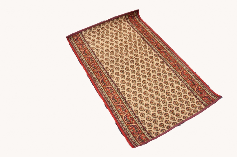A BELGIUM 'SUPER TAJ' LOOM WOVEN ALL-WOOL RUG, of Persian all-over floral design on a fawn field,