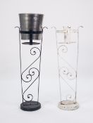 PAIR OF PAINTED WROUGHT METAL ICE BUCKET HOLDERS, each with open scrollwork centre and circular