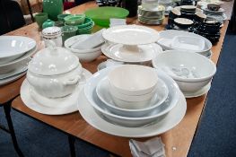 COLLECTION OF WHITE GLAZED POTTERY KITCHEN WARES, including: TWO HANDLED TUREEN AND COVER, SERVING