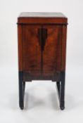 A 1930's 'ACME' PRODUCT WALNUT, MACASSAR EBONY AND PARCEL EBONISED CABINET, with lift up top