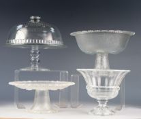 MOULDED GLASS PEDESTAL CAKE STAND WITH DOMED COVER, together with a FROSTED GLASS CAKE STAND AND