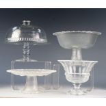 MOULDED GLASS PEDESTAL CAKE STAND WITH DOMED COVER, together with a FROSTED GLASS CAKE STAND AND