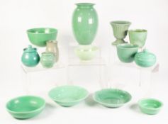 FOURTEEN PIECES OF CELADON OR GREEN GLAZED POTTERY, including: VASES, DISHES, BOWL, CIRCULAR BOX AND
