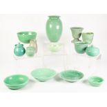 FOURTEEN PIECES OF CELADON OR GREEN GLAZED POTTERY, including: VASES, DISHES, BOWL, CIRCULAR BOX AND