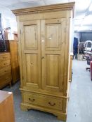 A PINE GEORGIAN STYLE TWO DOOR WARDROBE WITH ONE LONG DRAWER BELOW, 3'6" WIDE OVERALL