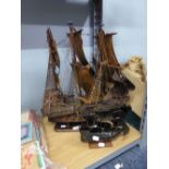 SCRATCH BUILT WOOD AND MANUFACTURED BOARD MODEL OF A MAN-O-WAR, with painted paper sails, on