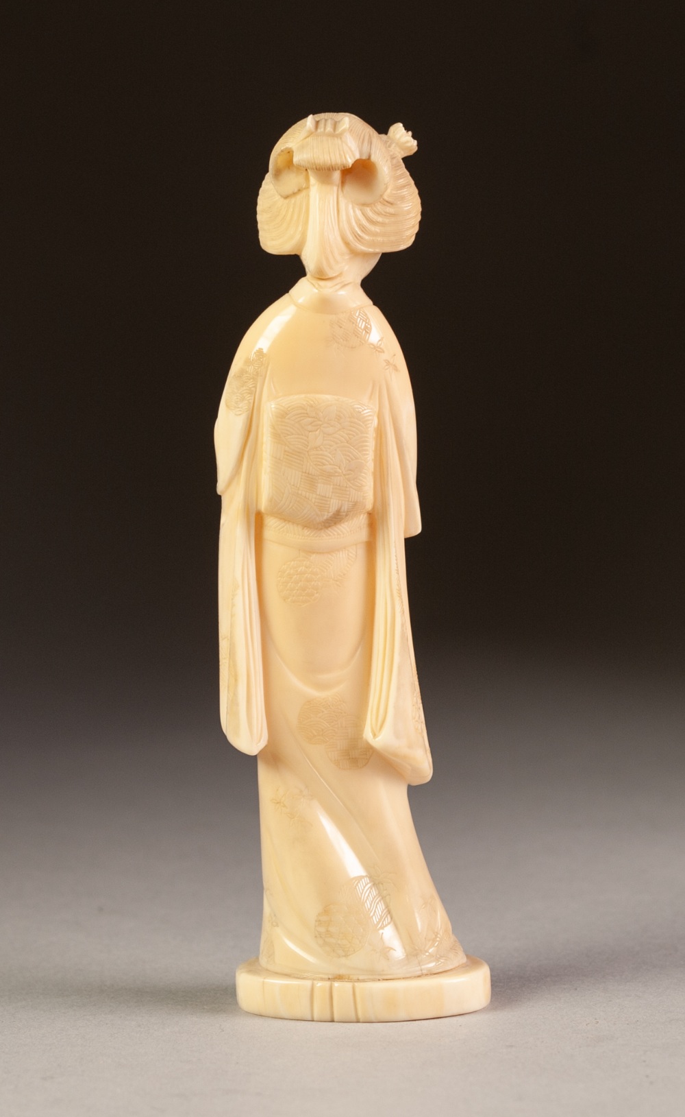 JAPANESE MEIJI PERIOD CARVED ONE PIECE IVORY FIGURE OF A GEISHA, 6" (15.2cm) high - Image 3 of 3