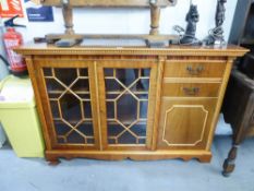 A MAHOGANY SMALL BOOKCASE WITH TWO ASTRAGAL GLAZED DOORS WITH END CUPBOARD AND TWO SHORT DRAWERS