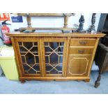 A MAHOGANY SMALL BOOKCASE WITH TWO ASTRAGAL GLAZED DOORS WITH END CUPBOARD AND TWO SHORT DRAWERS