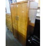 A GENT'S WALNUTWOOD SEMI-FITTED SMALL WARDROBE