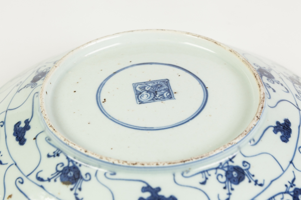 A CHINESE CHING DYNASTY SHALLOW DISH, painted autour in underglaze blue with compartmental ruyi - Image 2 of 2