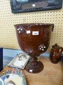 NINETEENTH CENTURY LARGE BROWN GLAZED TERRACOTTA CUP SHAPED JARDINIERE ON MATCHING PEDESTAL STAND,