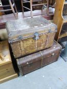 A LARGE FIBRE CABIN TRUNK AND A SMALLER METAL TRUNK (2)