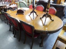 AN EDWARDIAN MAHOGANY WIND-OUT 'D' END EXTENDING DINING TABLE, WITH TWO ADDITIONAL LEAVES, ALL