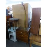 A SMALL ART DECO WALNUTWOOD LOW COCKTAIL CABINET WITH FALL-FRONT AND GLASS SHELF AND A STANDARD LAMP