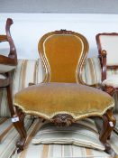 A VICTORIAN WALNUTWOOD FRAMED SPOON BACK LADY'S CHAIR