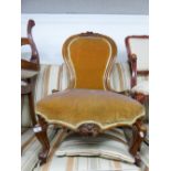 A VICTORIAN WALNUTWOOD FRAMED SPOON BACK LADY'S CHAIR