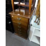 A WALNUTWOOD SMALL NARROW CHEST OF SIX SMALL DRAWERS, 18" WIDE