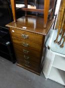 A WALNUTWOOD SMALL NARROW CHEST OF SIX SMALL DRAWERS, 18" WIDE