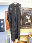 CHINESE BLACK SILK FULL-LENGTH DRESSING GOWN, EMBROIDERED AND PADDED DECORATION IN COLOURED AND GOLD