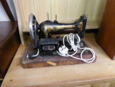 SINGER ELECTRIC PORTABLE SEWING MACHINE IN WOODEN DOME TOPPED CASE (ORIGINALLY A MANUAL MACHINE)