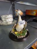 A RESIN ORNAMENT 'GREAT CRESTED GREBE'