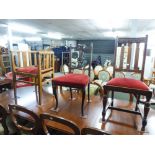 AN EDWARDIAN LIGHT OAK TUB CHAIR WITH UPSIDE-DOWN HEART PIERCING TO THE CENTRAL SPLAT, HAVING PAD