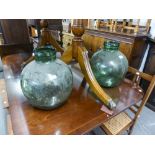 TWO GREEN GLASS DEMI-JOHNS (2)