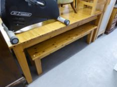 A LARGE PINE EXTENDING DINING TABLE, WITH TWO BENCH SEATS AND A SIMILAR DINING CHAIR (4)