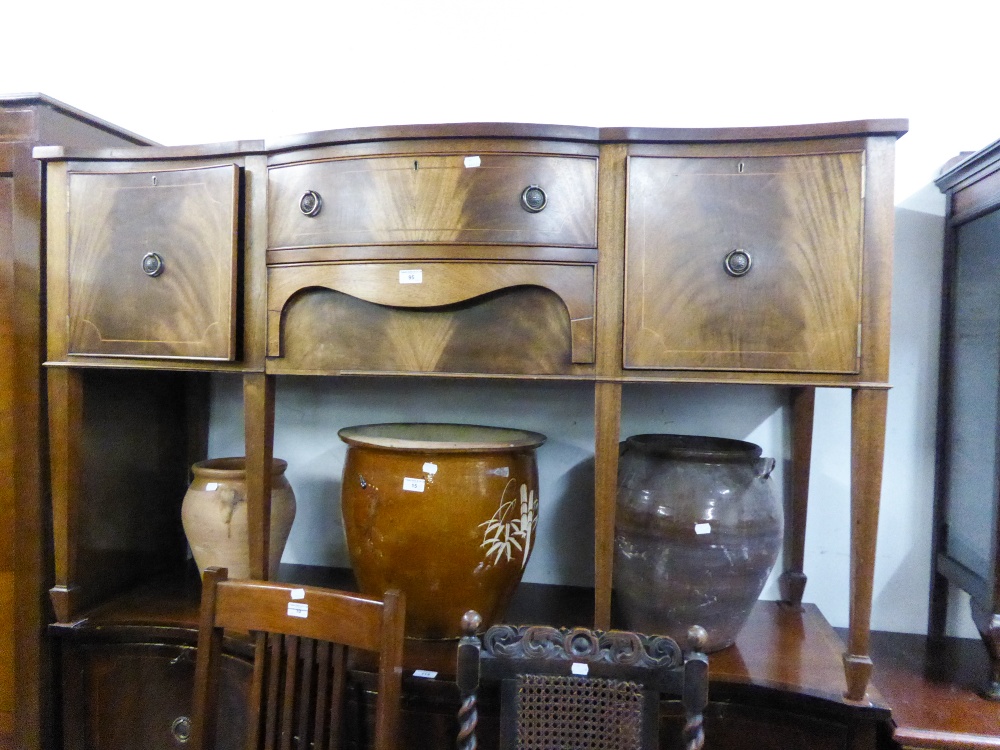 A TWENTIETH CENTURY REPRODUCTION INLAID MAHOGANY SERPENTINE SIDEBOARD, HAVING TWO CENTRAL DRAWERS