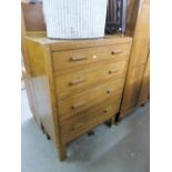 AN OAK CHEST OF FOUR GRADUATED LONG DRAWERS