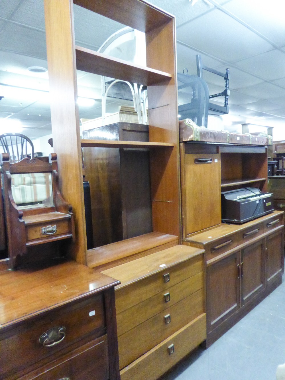 A MODERN TEAK CHEST OF FOUR LONG DRAWERS WITH TALL OPEN BOOKCASE SURMOUNTING