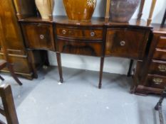 A REPRODUCTION MAHOGANY SERPENTINE FRONTED SIDEBOARD