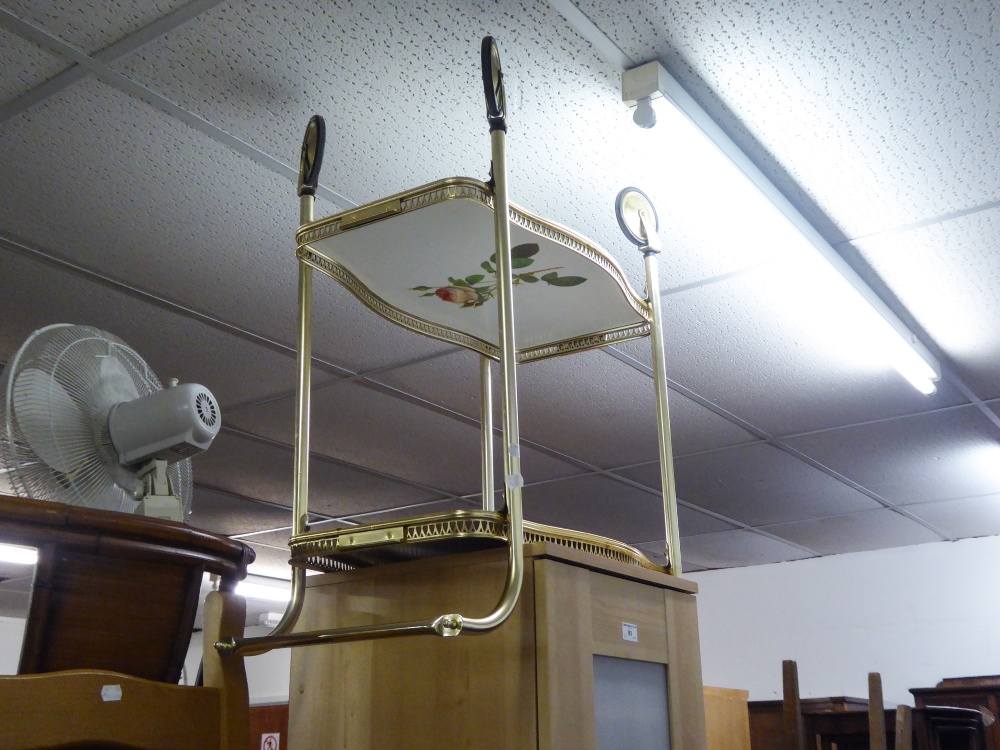 A MODERN NARROW IKEA FLOOR STANDING CUPBOARD WITH PLASTIC FRONT, A GILT TEA TROLLEY AND A BLACK - Image 2 of 3