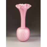 QUILTED PINK SATIN GLASS BOTTLE VASE, with wavy rim, 12 ¾" (32.4cm) high