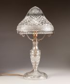 1930's CUT GLASS TABLE LAMP, with vase shaped column, high domed shade with gilt metal fittings, and