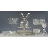 A QUALITY OF CUT GLASS DRINKING GLASSES, FRUIT BOWL AND MATCHING SMALLER SERVING BOWLS ETC......