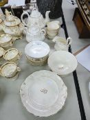 EARLY VICTORIAN WHITE CHINA ROCOCO STYLE TEA SERVICE WITH SINGLE GILT SPRIG AND GILT LINE