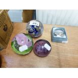 A CAITHNESS 'CALYPSO' PAPERWEIGHT, ANOTHER BY MIKE HUNTER AND TWO SMALLER EXAMPLES (4)