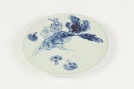 A TWENTIETH CENTURY CHINESE PORCELAIN SMALL PLATE, painted in underglaze blue with root vegetables