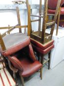 EIGHT MODERN DINING CHAIRS HAVING RED HIDE PAD BACK AND SEAT, WITH STUD DETAIL AND TWO MATCHING
