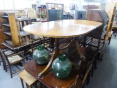 A REPRODUCTION MAHOGANY TWIN PILLAR DINING TABLE