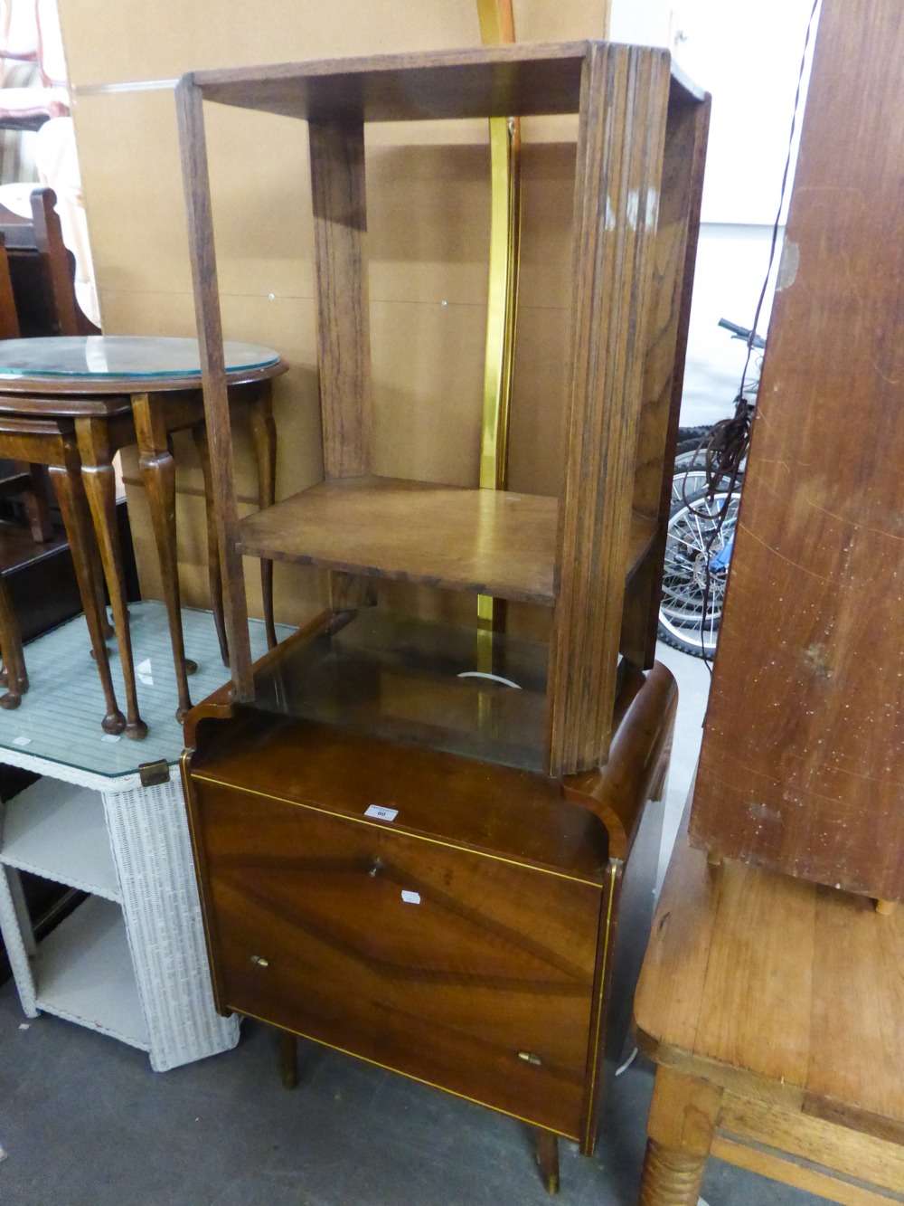 AN OAK TWO TIER OBLONG OCCASIONAL TABLE WITH CANTED FLUTED PANEL LEGS