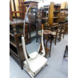 A MID TWENTIETH CENTURY OAK TWO TIER JARDINIERE STAND, AND A WHITE CHEVAL MIRROR, CIRCA 1970's