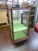 A MAHOGANY TABLE TOP RECTANGULAR DISPLAY CABINET,WITH BEVELLED GLASS PANELS, THE REAR PANEL DOOR