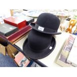 CHRISTY'S, LONDON, GENTLEMAN'S BLACK BOWLER HAT, AND ANOTHER, LABELLED BUCKLEY AND PROCKTER LTD.