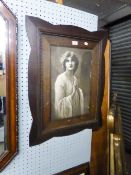 A MONOCHROME PHOTOGRAVURE, YOUNG WOMAN IN FLOWING ROBE AND THE OAK ARTS AND CRAFTS FRAME