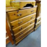 A PINE CHEST OF FIVE LONG DRAWERS, ON BRACKET FEET