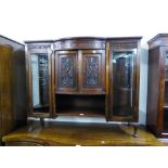 A LOW DISPLAY CABINET WITH TWO BOWED DOORS, FLANKED BY TWO GLASS DOORS (lacks top)